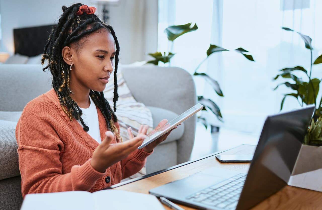 a woman student making research with her computer