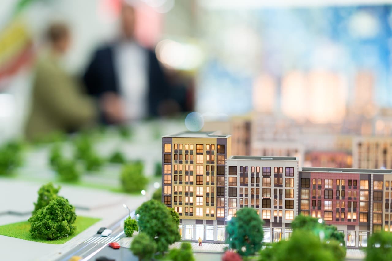 a model of a building sitting on the table