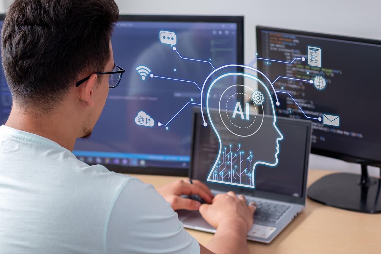 a man dealing with AI and its areas on his computer