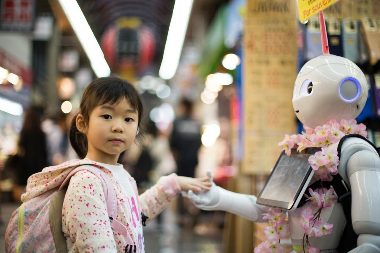 the little girl and a robot meeting