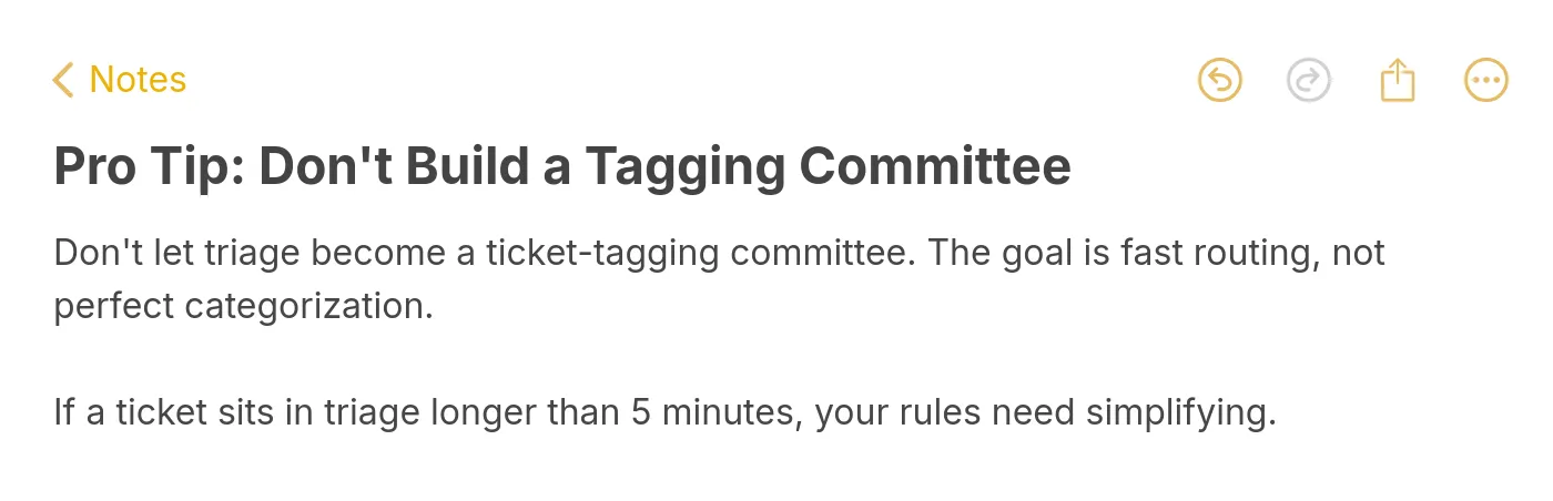 Apple Notes style pro tip warning that triage should focus on fast routing rather than perfect categorization