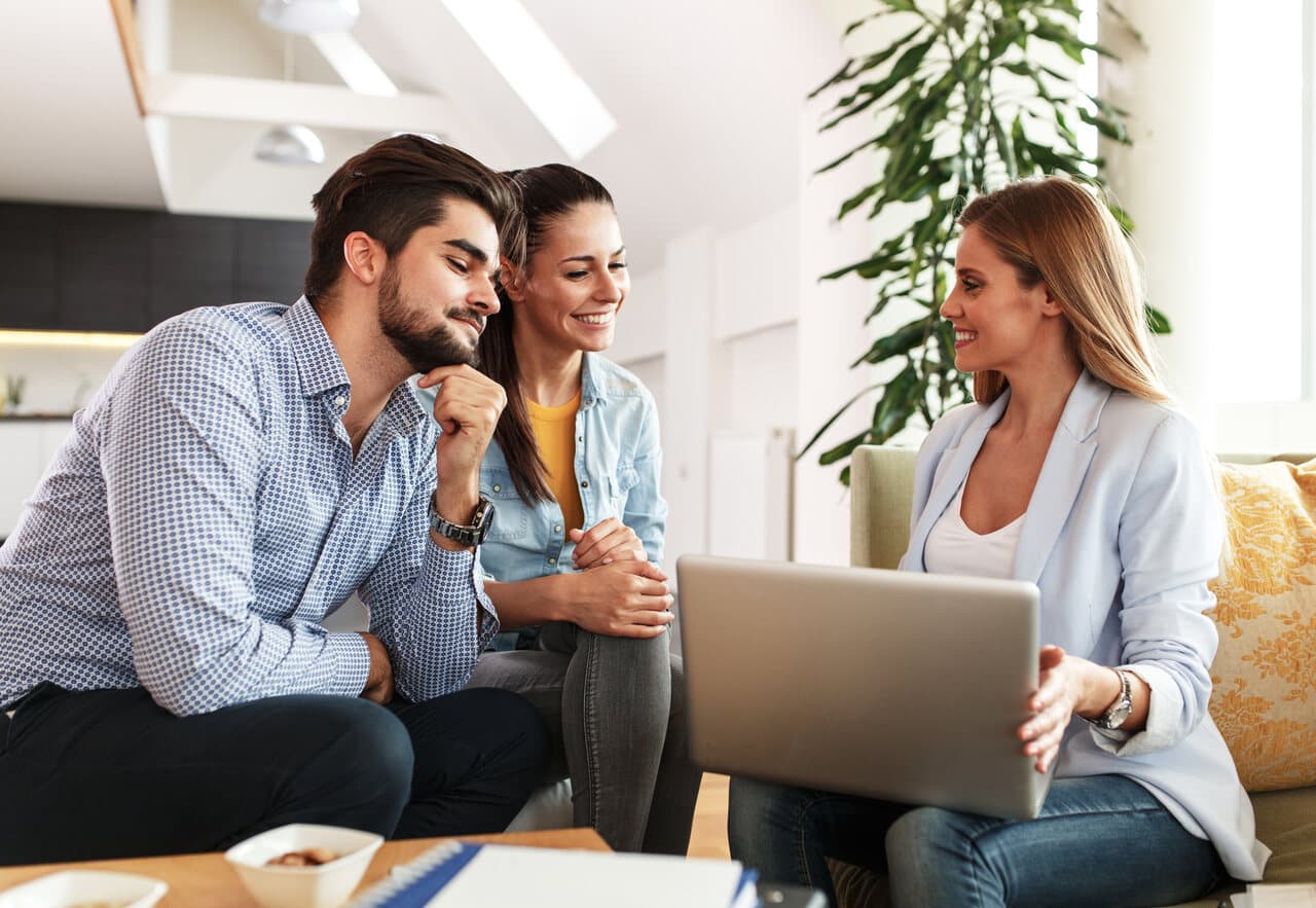 a real estate agent having meeting with customers
