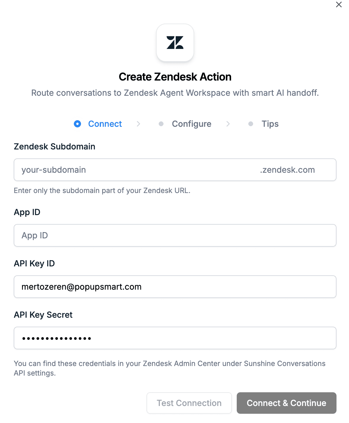 LiveChatAI Zendesk AI Action setup screen showing Connect, Configure, and Tips steps with fields for Zendesk Subdomain, App ID, API Key ID, and API Key Secret